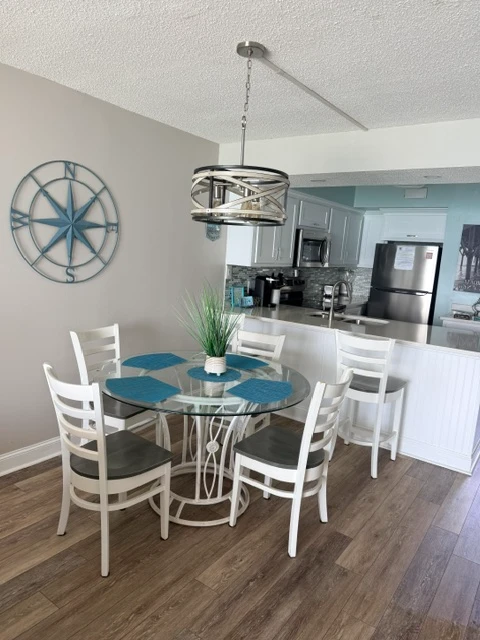 Condo dining area and kitchen cleaned by Spark & Shine