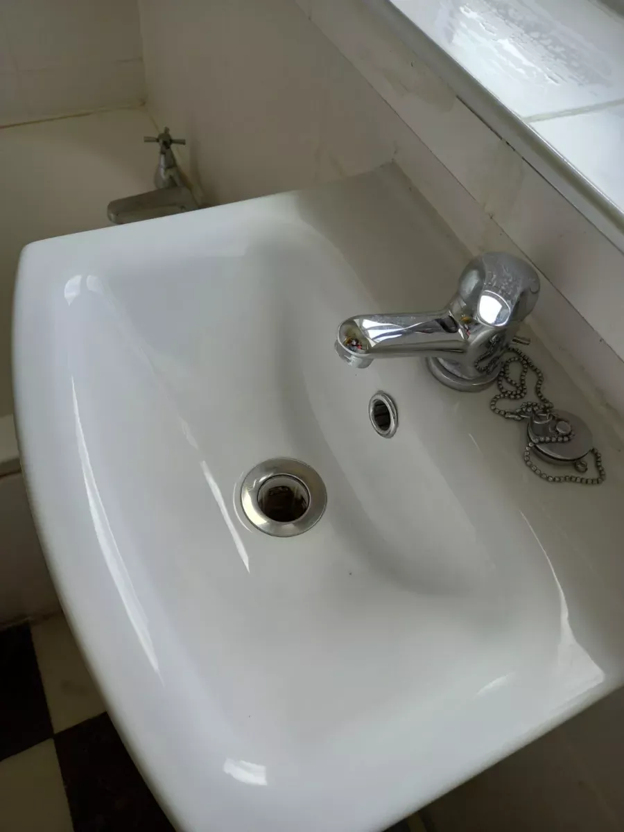 Sink and taps polished to a shine, cleaned by Spark & Shine Cleaning Co. in Myrtle Beach, SC