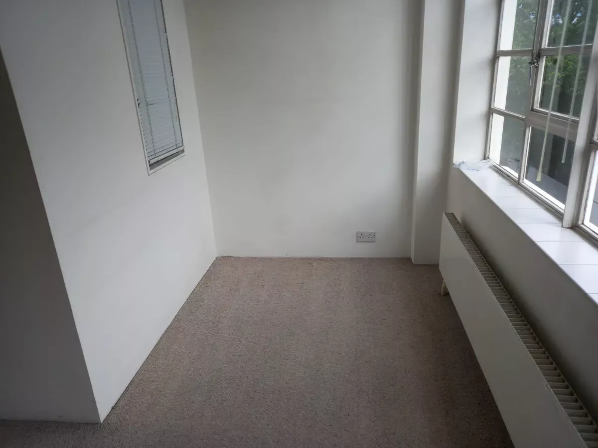 Empty room vacuumed and ready for move-in, cleaned by Spark & Shine Cleaning Co. in Myrtle Beach, SC